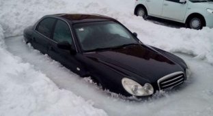 Автомобили, скованные льдом (18 фото)