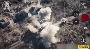 Ukrainian M2A2 Bradley infantry fighting vehicle, supported by FPV drones, destroys buildings with Russian military personnel near Avdiivka