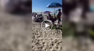 In the US, remote workers set up an office right on the beach.