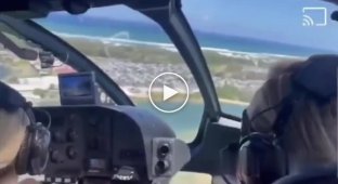 Four passengers killed in helicopter collision over Australian beach