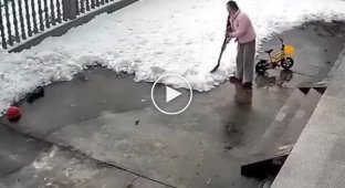 A woman was covered by a huge mass of snow