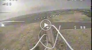 An enemy vehicle flies into a ditch and explodes before an attack by a Ukrainian drone