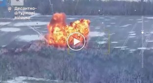 A Russian infantry fighting vehicle with troops explodes after hitting an anti-tank mine in the Kursk region