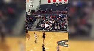 Unusual basketball throw at the final whistle from a girl