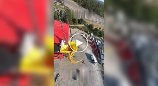 A group of acrobats DD Squad showed a jump over a 30-meter garbage chute