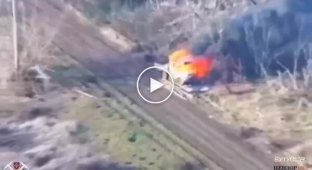 An enemy car is on fire after an attack by the Wild Hornets drone
