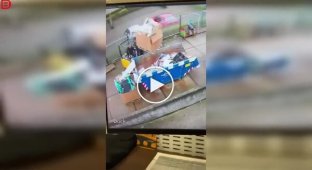 A forklift driver struggles with a stubborn box