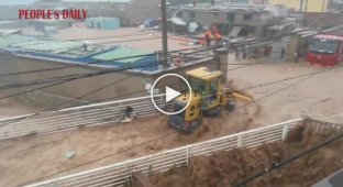 A worker used a bulldozer to save a family during a flood