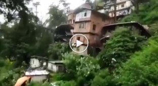 Landslides bring down houses and destroy infrastructure in India (quiet sound)