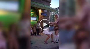 Easy and with a smile: a girl uses her friend as a squat bar