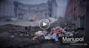 Mariupol, the ruins of a bombed-out theater where civilians hid. The occupiers now cover up the traces of their crimes