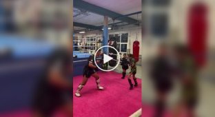 A 10-year-old athlete demonstrates her kickboxing skills
