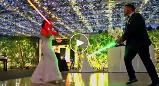 Star Wars fans celebrated their wedding with a lightsaber battle