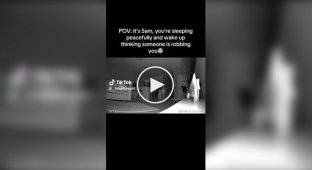 A surveillance camera captured burglars in a woman's house