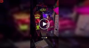 A daring blow: an attempt to hit a punching bag with a "non-working" left hand.
