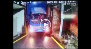 A Chinese truck driver navigates a route through a bottleneck.