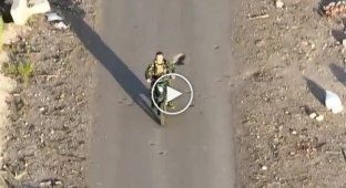 The occupier throws his motorcycle and weapons and runs away through the woods after seeing a Ukrainian drone