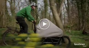 A bicycle equipped with a built-in tent and a rest area