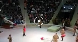A very dangerous trick performed by an acrobat