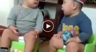 Serious conversation between two little men