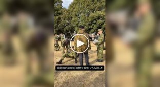 The Japanese Defense Minister and an army backpack