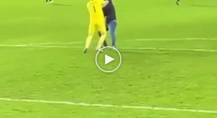 A football fan attacked Sevilla goalkeeper Marko Dmitrovic during a Europa League match