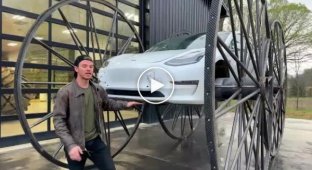 Autobloggers attached huge wheels to Tesla and drove it down a hill on autopilot