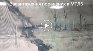 Уничтожаем МТЛБ который загружали российскими раненными с помощью дрона камикадзе