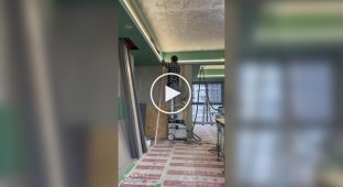 Chinese workers use hydraulic stilts