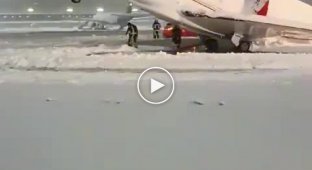 In Germany, the plane is frozen to the runway