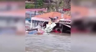 In Turkey, a dog was rescued that almost drowned during a powerful flood.