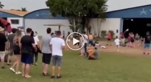 Paratrooper crashes into festival-goers