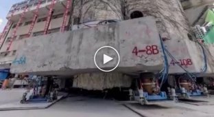 В Китае использовали 200 гидравлических роботизированных ходунков, чтобы переместить школу