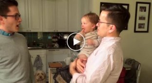 Baby sees daddy's twin for the first time