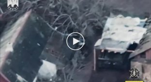 An enemy infantry fighting vehicle and the hiding place of the Russian invaders are on fire from a precise drone strike