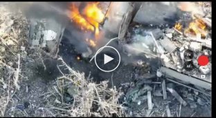 Two occupiers are burning alive near a damaged enemy armored vehicle