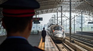 Железные дороги и поезда в Китае (23 фото)