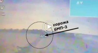 Детонация БК российской БМП-3 после прилета украинского FPV-дрона в Луганской области