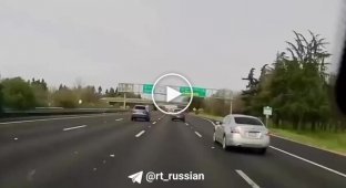 A car fell from an overpass onto a busy highway