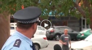 Австралийский полицейский задержал пьяного во время телеинтервью