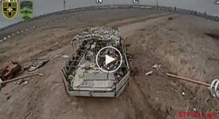A kamikaze drone hits an enemy BTR-82A in the Bakhmut direction