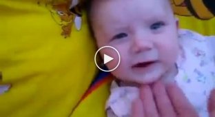 Funny baby teasing dad