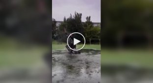 A young woman danced in the pouring rain