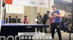 A robot trainer for playing table tennis