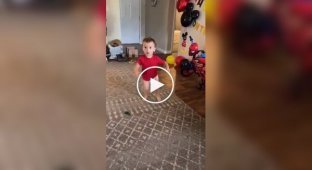 A child's reaction to a gift in honor of his 2nd birthday