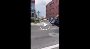 The motorcyclist tried to do a trick and overdid it