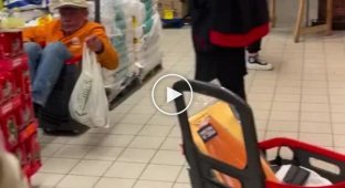 A man in a supermarket asks for help