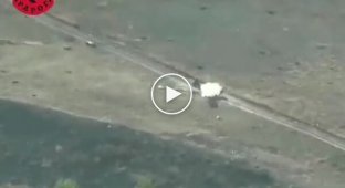 A kamikaze drone of the 24th Separate Assault Brigade attacks two occupiers on motorcycles