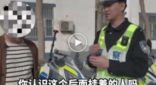 Китаянка заподозрила измену мужа и повисла на прицепе его машины, чтобы проследить за ним