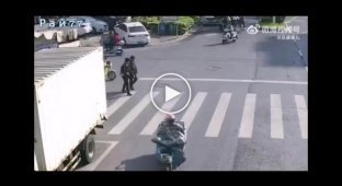 The motorcyclist lassoed and took away the pedestrian in an unknown direction